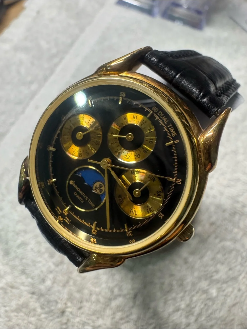 Quartz Men's Gold and Black Multi-Function Watch